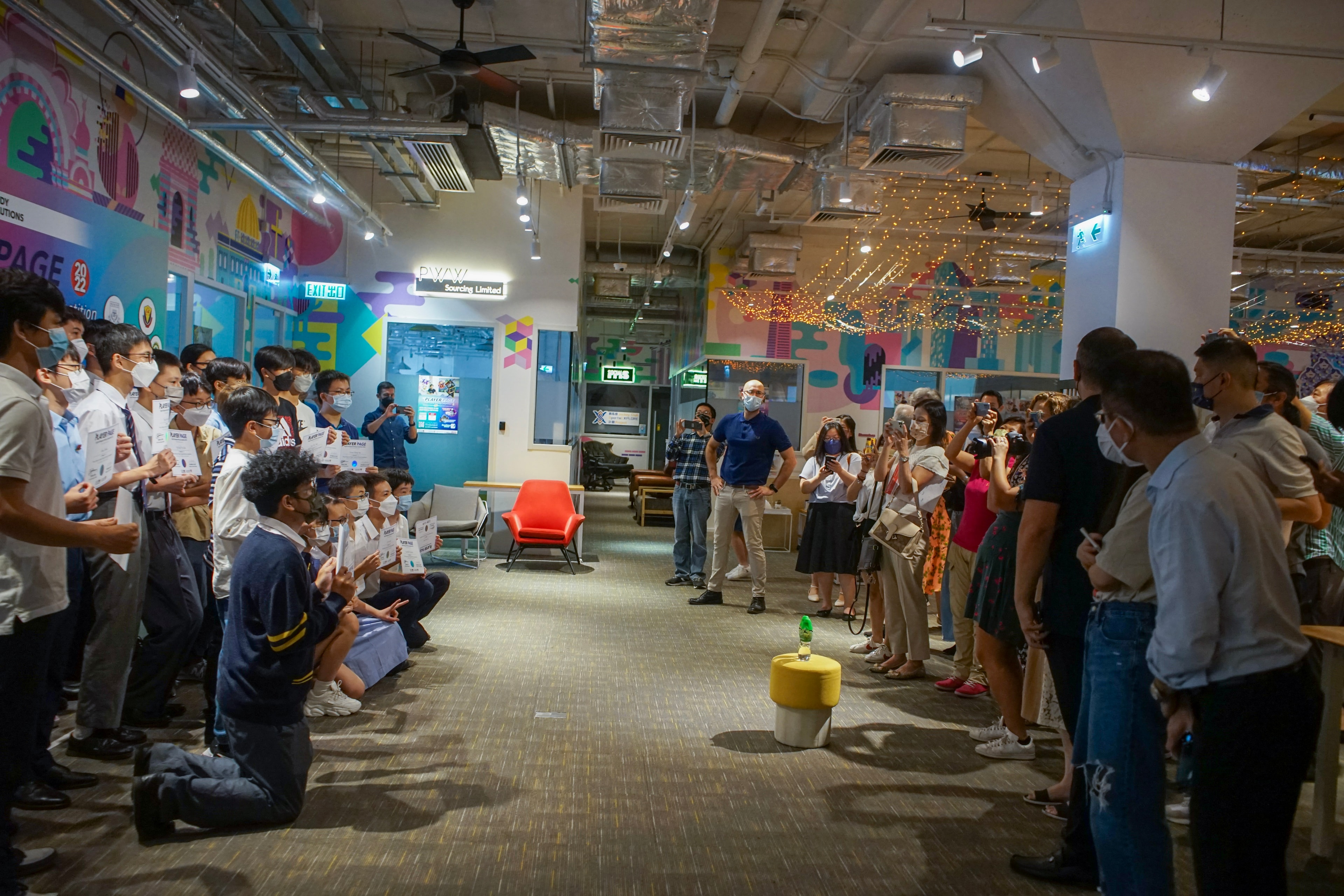 Children gathered at the indoor event space