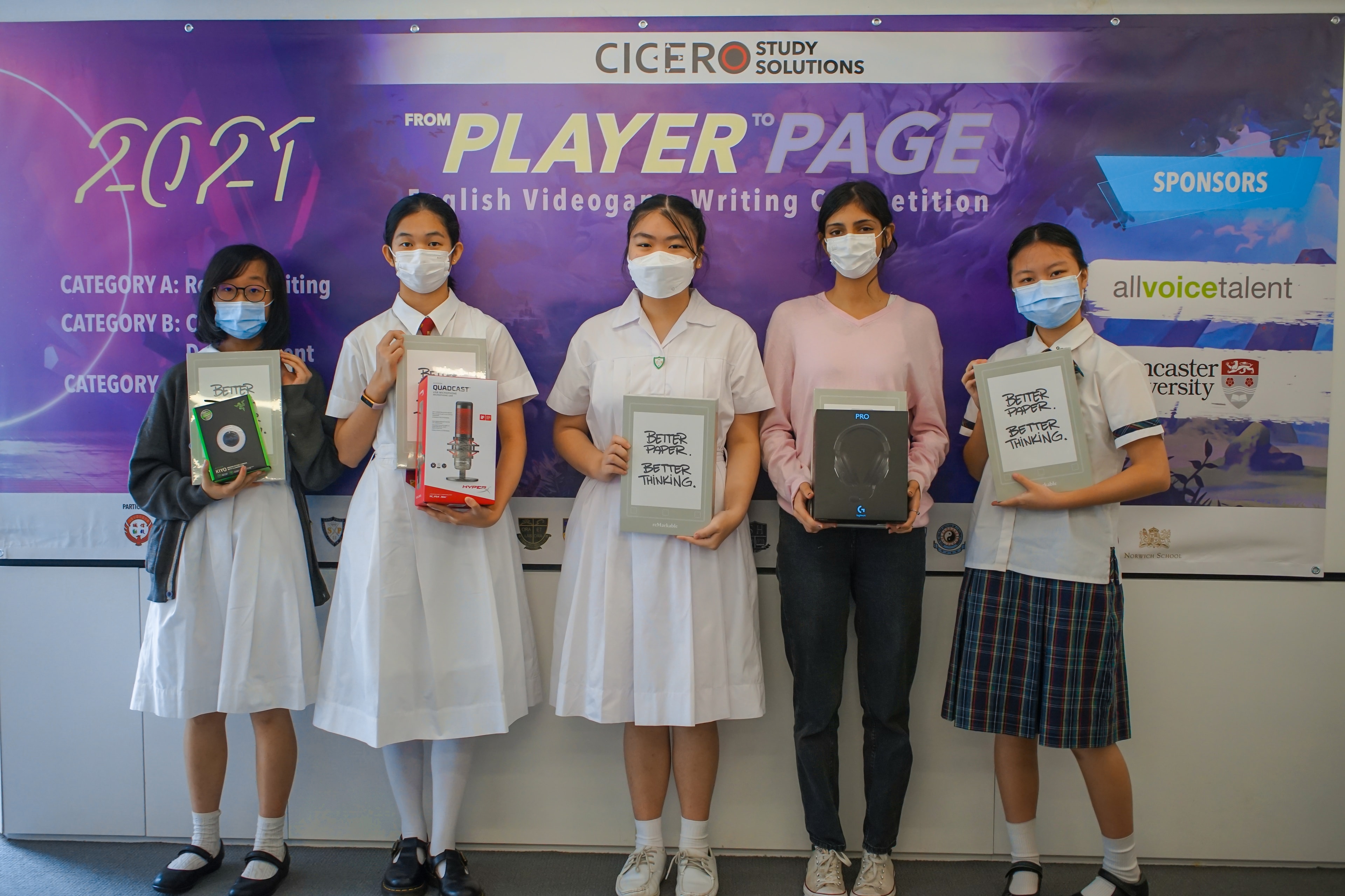 Students holding awards at the inaugural competition