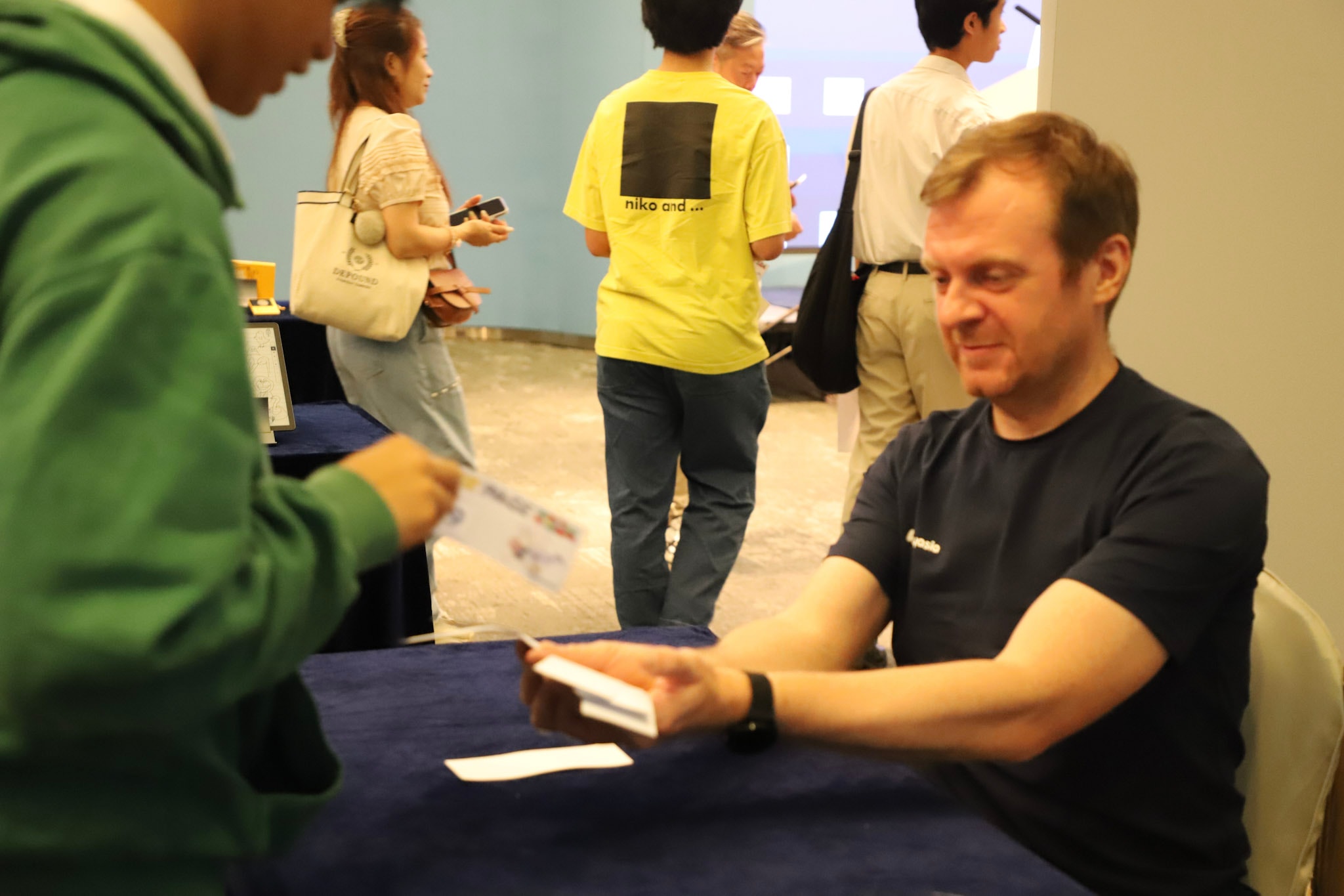 Signing autographs at the event