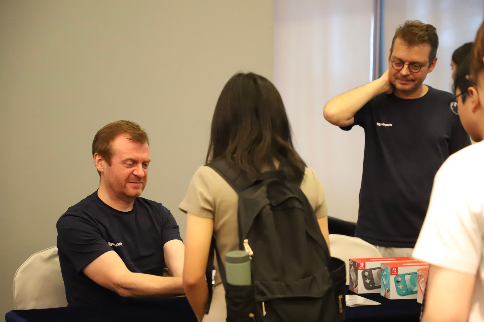 Group discussion with gaming consoles